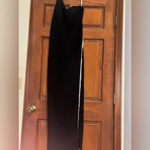 Long one-shouldered black dress with a flashing slit!